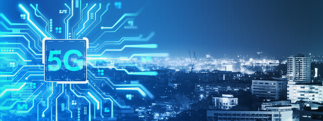 5G network technology concept on digital circuit board overlay with city skyline at night representing fast internet and future connection.
