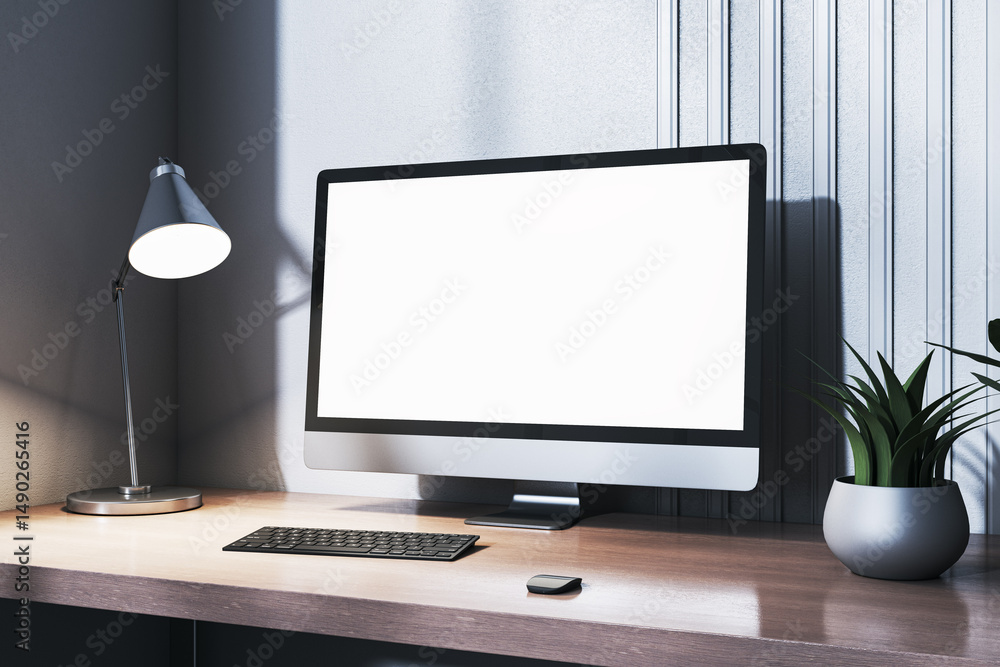 Aufkleber blank desktop computer monitor mockup on wooden desk in minimalist workspace with lamp and plant in 