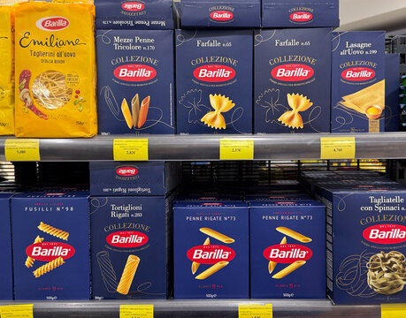 Budva, Montenegro - April 22, 2025: Barilla pasta boxes displayed on supermarket shelf with vibrant packaging