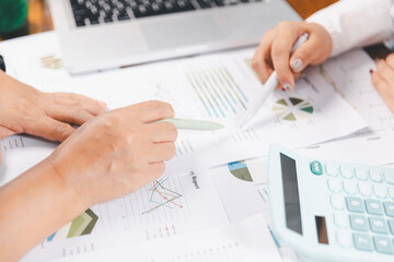Business people working on sustainable innovation project. renewable energy concept. Teamwork Meeting, partner on model building company office technology, based green businesses and global warming.