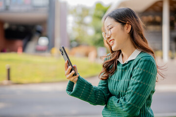 Students playing with mobile phones and laughing