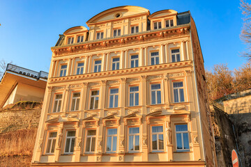 Historic european building with ornate facade in warm sunlight