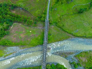beautiful morning view panorama of indonesia agriculture industry rice fields with beautiful sky colors natural light
