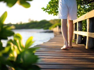 Barefoot stroll on wooden pier by the water relaxing summer vacation travel destination