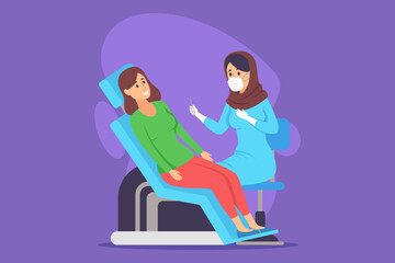 Healthcare professional in scrubs focusing on patient seated in dental chair