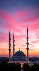 Architectural landmark silhouette against colorful sunset sky with minarets and dome