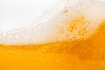 Close up bright orange Oil or beer splash texture and nature waves, Beautiful waves curve and...