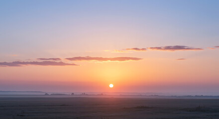 Obraz premium Sunrise over vast flatland