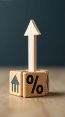 Interest rate financial and mortgage rates concept. Wooden blocks with Icon percentage symbol and arrow pointing up. company business growth and sales, interest rate, tax, real estate.