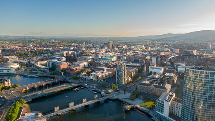 Aerial view on Lagan River and buildings in City centre of Belfast Northern Ireland. Drone photo, high angle view of town