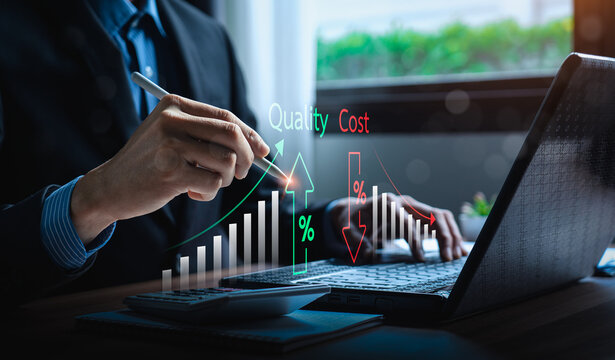 Business strategy concept for quality improvement and cost reduction with businessman analyzing bar chart data on laptop using stylus, boosting efficiency, value, profitability through smart planning