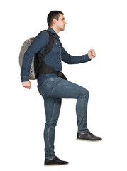 Young man traveler carrying a backpack starts climbing a stairway, side view full length portrait isolated on transparent background. Concept of career stairs to success
