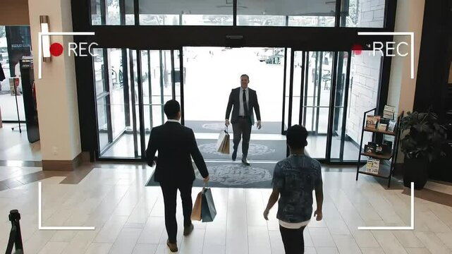 CCTV camera monitoring a busy shopping mall entrance, realistic lighting and details, security theme
