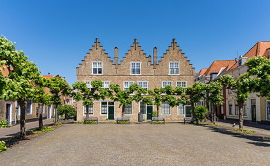 Square with historic stepped gabled houses in the old town of Vlissingen, province of Zeeland, Netherlands