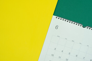 close up of calendar on the colorful  table background, planning for business meeting or travel planning concept