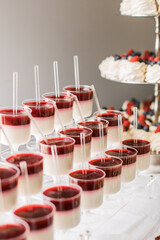 weddding desserts white panna cotta jello cups with strawberry 
