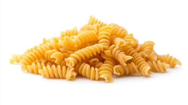 Pile of uncooked rotini pasta spirals isolated on a white background