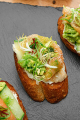 Avocado Bruschetta on Slate Board