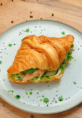 Croissant sandwich with herbs