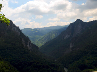 Naklejka premium Explore the Breathtaking Landscapes of Tara River Canyon in Montenegro During a Sunny Day