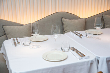 Elegant restaurant table set for dinner service.