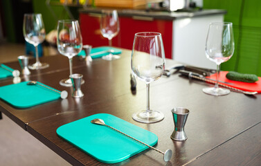 Bartending class table setup with tools.