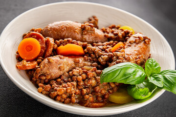 Sausage with lentils and vegetables appetizer vegetable dish fresh tasty gourmet food background on the table rustic food top view copy space