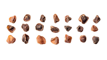 Obraz premium A collection of assorted dry seeds on a white background, showcasing their unique shapes and textures.