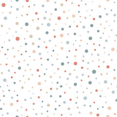 Confetti seamless pattern of scattered dots in various sizes. Cute background in minimalist style. Perfect for wrapping paper, birthday party design, fabric print, packaging, baby shower, kids textile