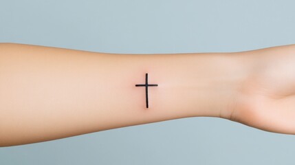 Minimalist Cross Wrist Tattoo: A Simple Symbol of Faith