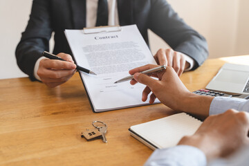property investment concept. Client signing a property leasing contract with landlord or agent