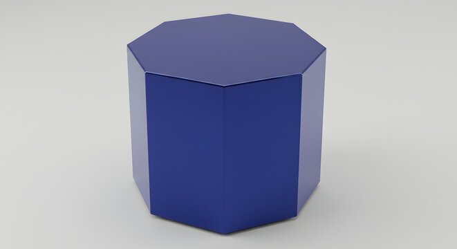 A blue octagonal prism standing on a white surface in a studio shot