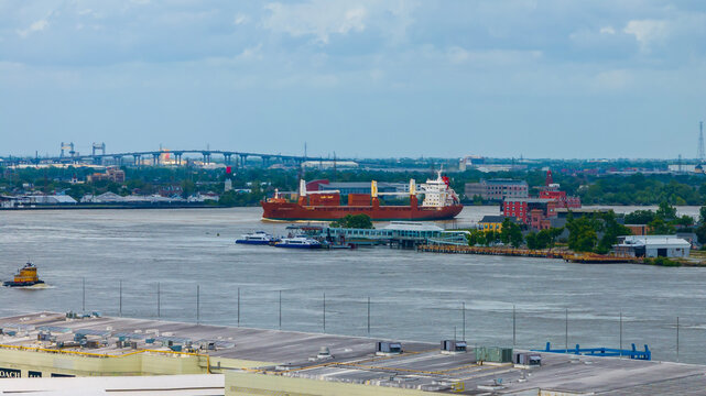 aerial shot of boats and ships sailing on the Mississippi River in New Orleans Louisiana USA