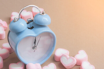 retro clock on wooden background