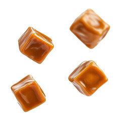 Caramel cubes flying in air isolated on white background. Set of delicious caramel candies floating isolated on white background. caramel cubes. 