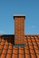 Naklejka premium red roof and chimney