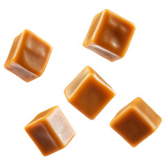 Caramel cubes flying in air isolated on white background. Set of delicious caramel candies floating isolated on white background. caramel cubes. 