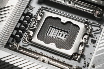 High-resolution macro image showing a close-up view of an empty CPU socket on a modern computer...