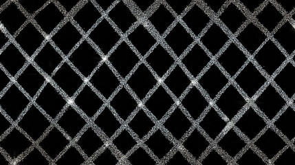 Seamless diamond pattern with sparkling silver accents on a black background