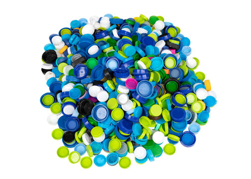 Pile of colorful plastic bottle caps on transparent background
