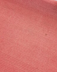 Texture of Reddish Textile Fabric Close-up for Background