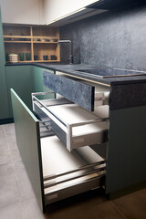 Induction cooker black tempered glass hob aspirating induction hob on marble stoneware countertop...