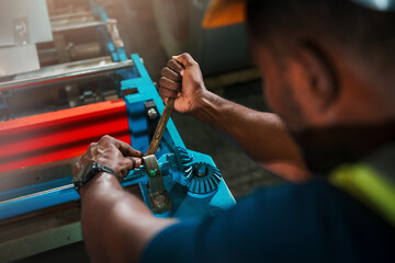 Machine Maintenance, African American Factory Technician In Heavy Manufacturing Environment