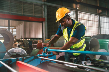 Machine Maintenance, African American Factory Technician In Heavy Manufacturing Environment