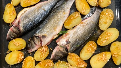 Roasted sea bass and garlic-infused potatoes evoke Easter Mediterranean feasts, culinary harmony,...