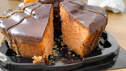 Chocolate-glazed pink sponge cake, whimsical dessert escape, reminiscent of Carnival, sugared...