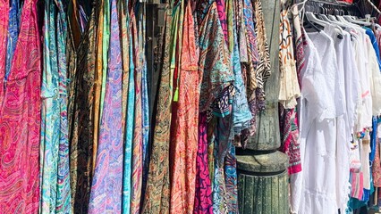 Vibrantly bohemian summer dresses sway like whispers of carnival nostalgia, celebrating Transglobal...