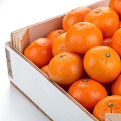 A bounty of tangerines overflowing from a rustic white wooden crate container