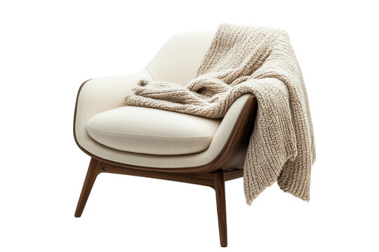 Envision cozy evenings A creamy chair draped with a warm knit blanket inviting relaxation and isolated on transparent background