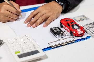 Man Signing Car Insurance Documents – Vehicle Ownership Concept